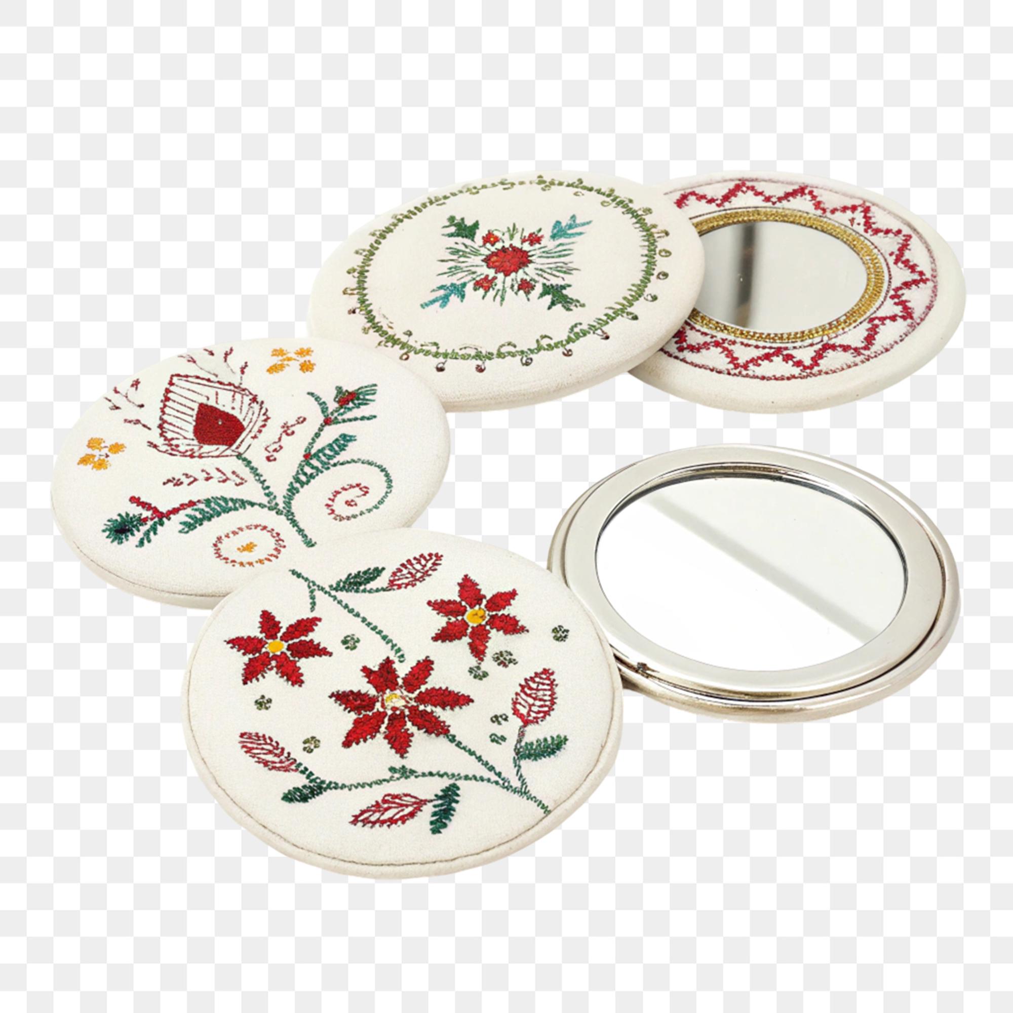 selection of embroidered badges on table